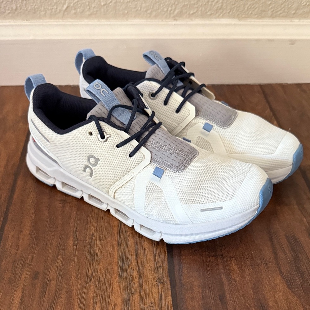 On Running White and Light Blue Athletic Shoes